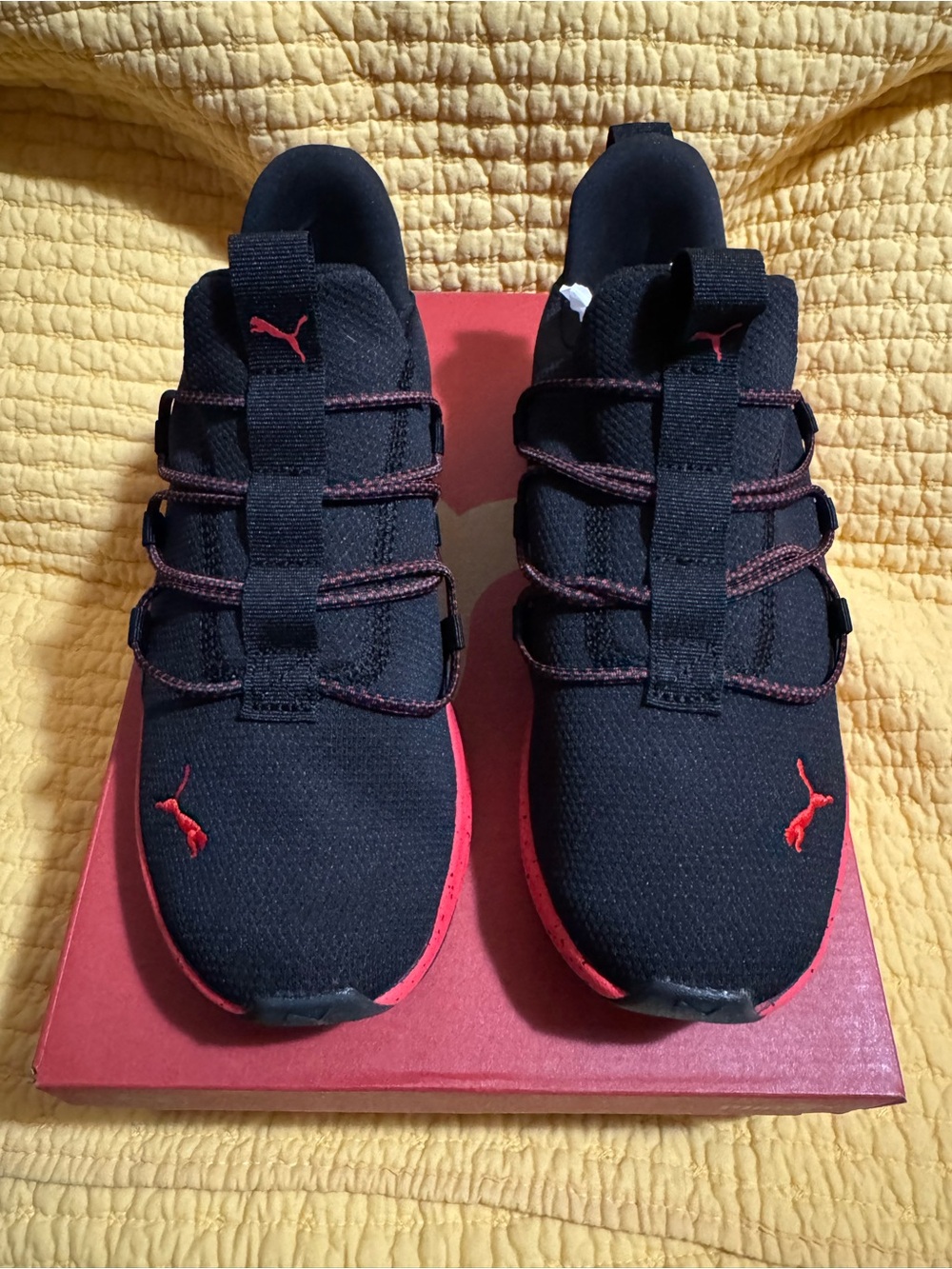 Puma Kids Black Sneakers with Red Accents